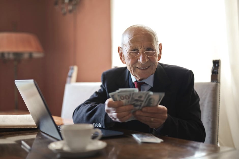 A retirement savings chart and a calculator on a desk, representing smart retirement investing moves for 2026.
