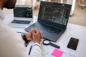 Visual breakdown of stock market workings: traders, graphs, and digital exchange interface showing key mechanisms.
